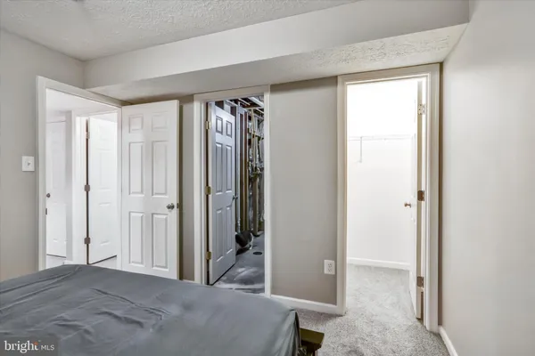 a view of a room with a wardrobe space
