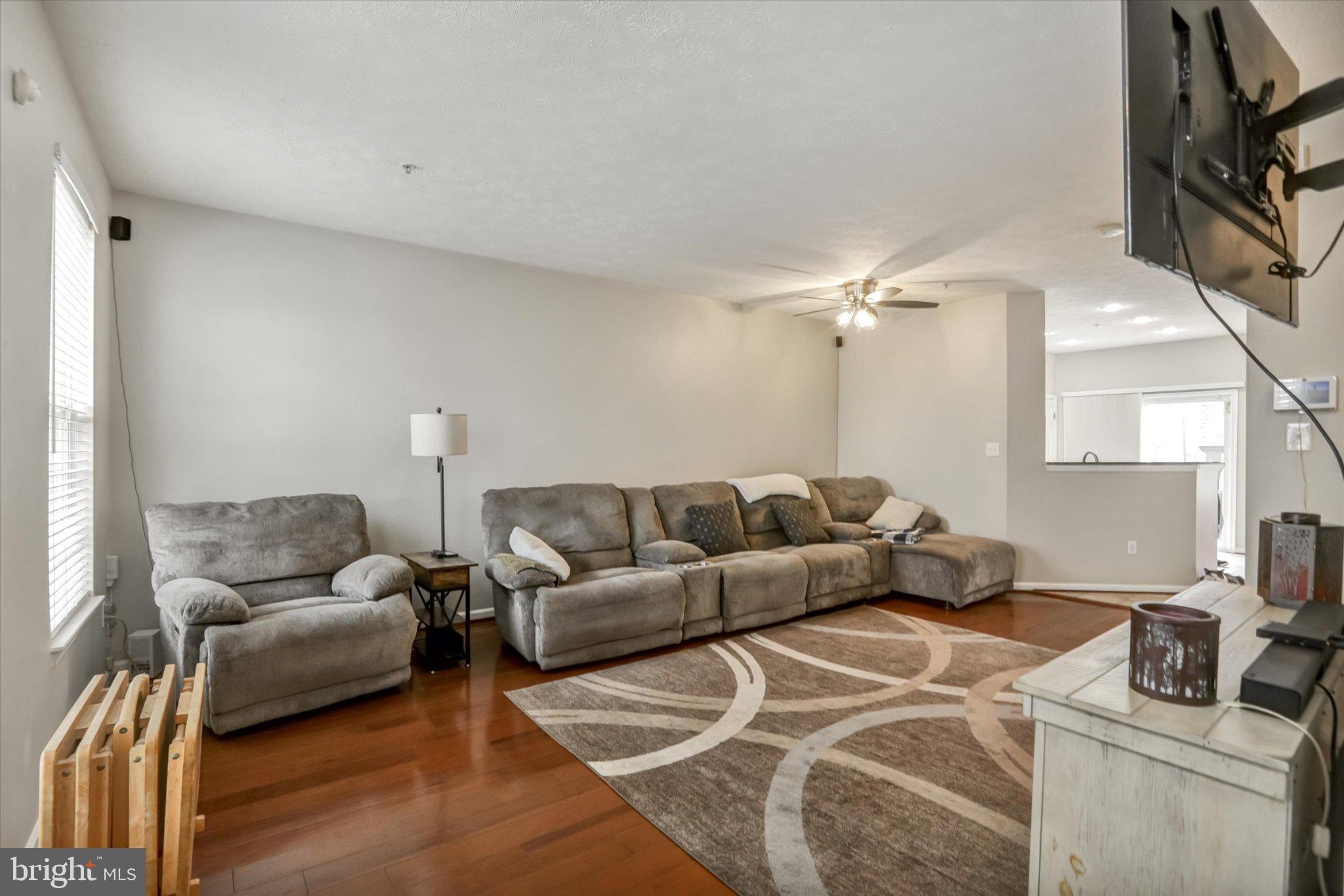 9663 Davison Road Middle River, MD 21220 - Photo 4 of 45 Spacious living area with warm tones.