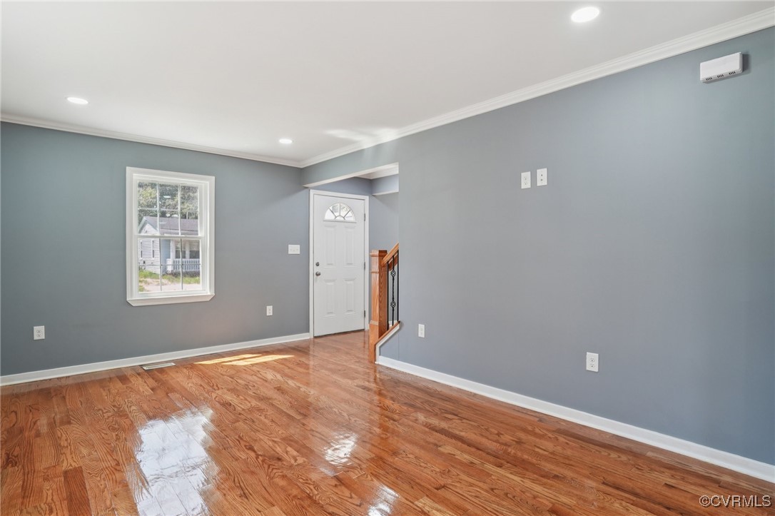 1133 Rome Street Petersburg, VA 23803 - Photo 12 of 33 Unfurnished room with ornamental molding, wood fin
