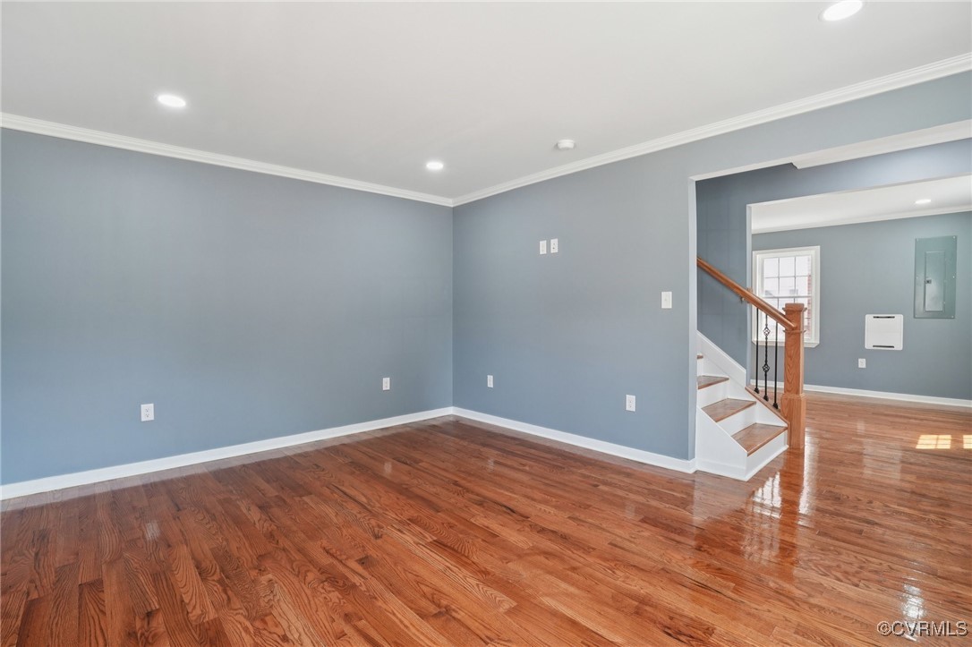 1133 Rome Street Petersburg, VA 23803 - Photo 14 of 33 Spare room with ornamental molding, stairs, wood f