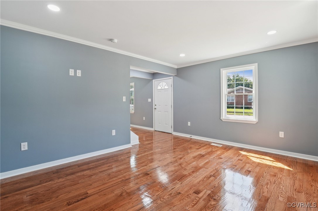 1133 Rome Street Petersburg, VA 23803 - Photo 15 of 33 Empty room featuring ornamental molding, wood fini
