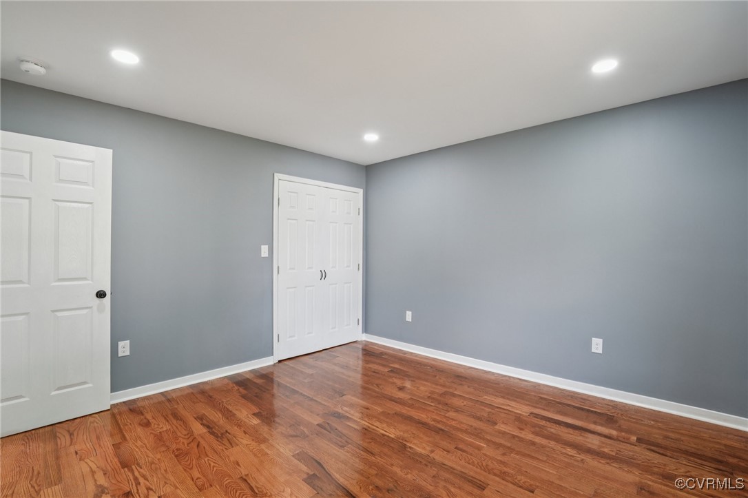 1133 Rome Street Petersburg, VA 23803 - Photo 20 of 33 Unfurnished room with wood finished floors and rec