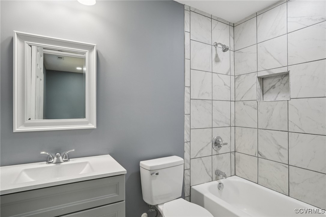 1133 Rome Street Petersburg, VA 23803 - Photo 21 of 33 Bathroom featuring vanity and shower / bath combin
