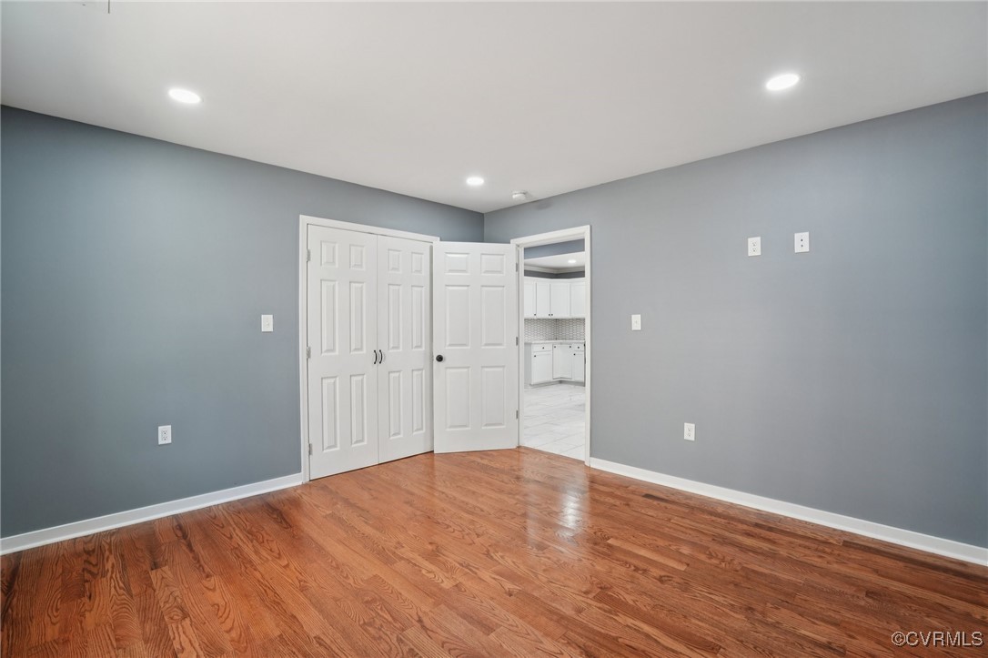 1133 Rome Street Petersburg, VA 23803 - Photo 23 of 33 Unfurnished bedroom with wood finished floors, rec