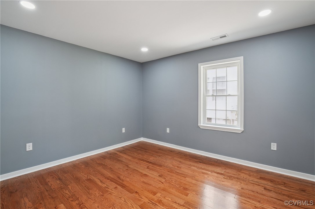 1133 Rome Street Petersburg, VA 23803 - Photo 25 of 33 Unfurnished room featuring wood finished floors an
