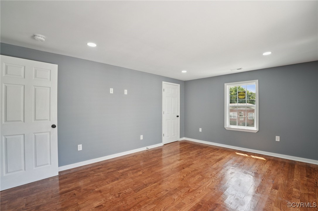 1133 Rome Street Petersburg, VA 23803 - Photo 30 of 33 Unfurnished room with wood finished floors and rec