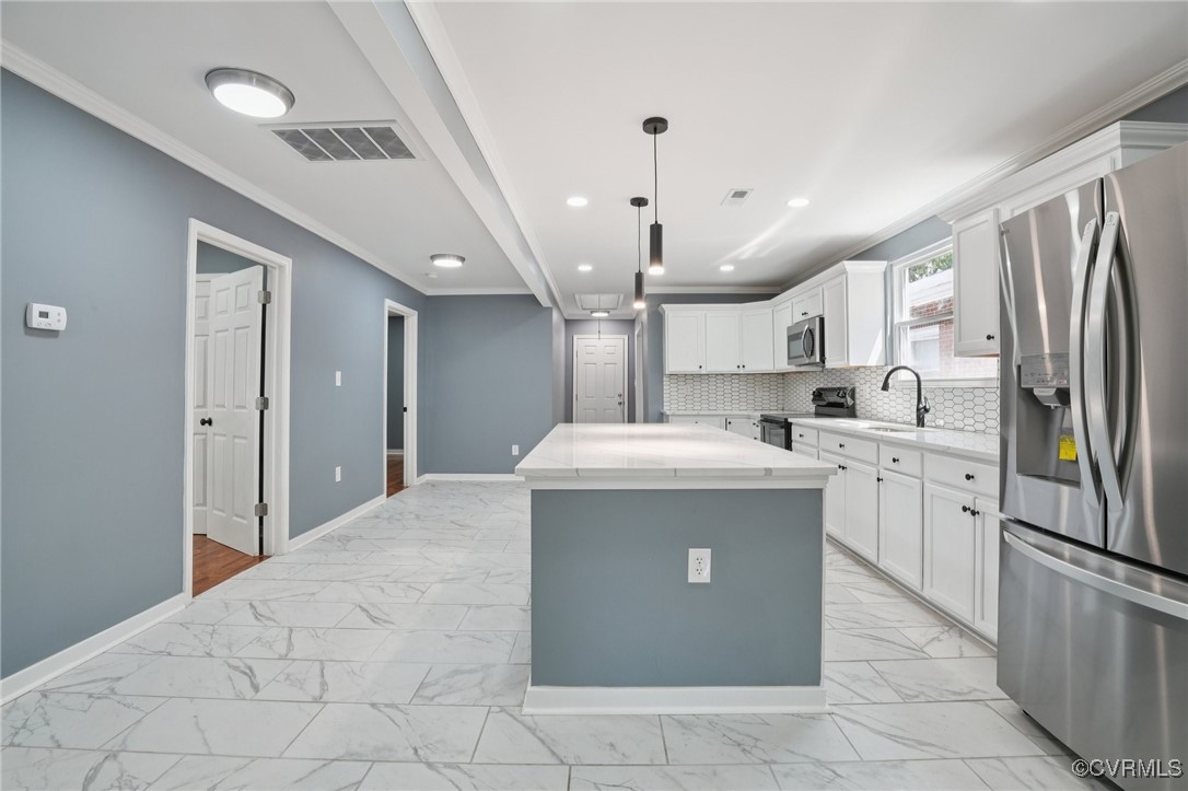 1133 Rome Street Petersburg, VA 23803 - Photo 3 of 33 Kitchen featuring light marble finish floors, appl