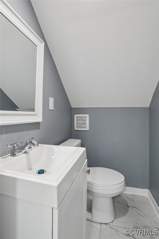 1133 Rome Street Petersburg, VA 23803 - Photo 9 of 33 Half bath featuring vanity, marble look tile floor
