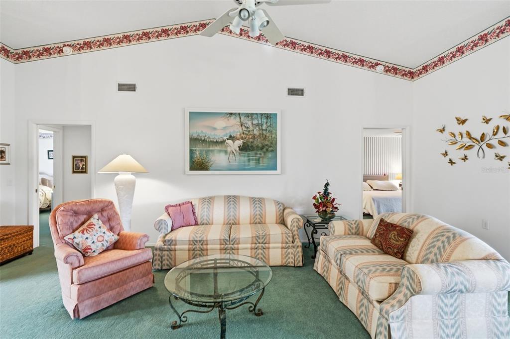 7354 Woodhollow Road Spring Hill, FL 34606 - Photo 12 of 47 a living room with furniture