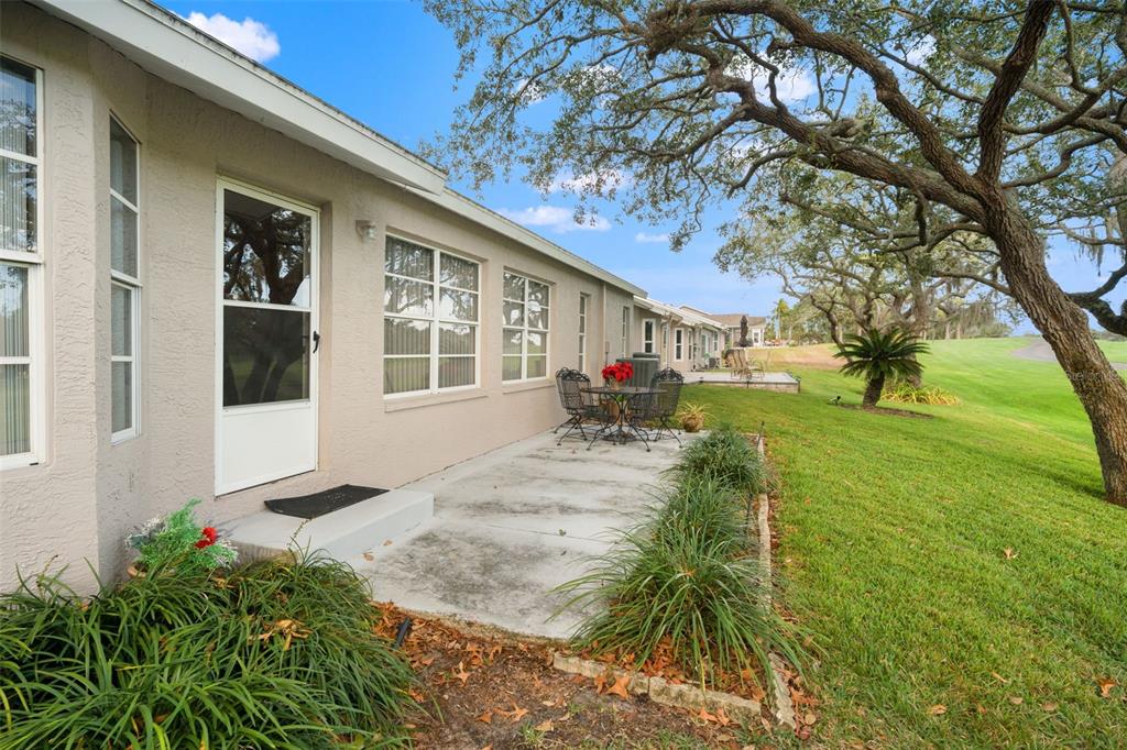 7354 Woodhollow Road Spring Hill, FL 34606 - Photo 47 of 47 a view of house with yard