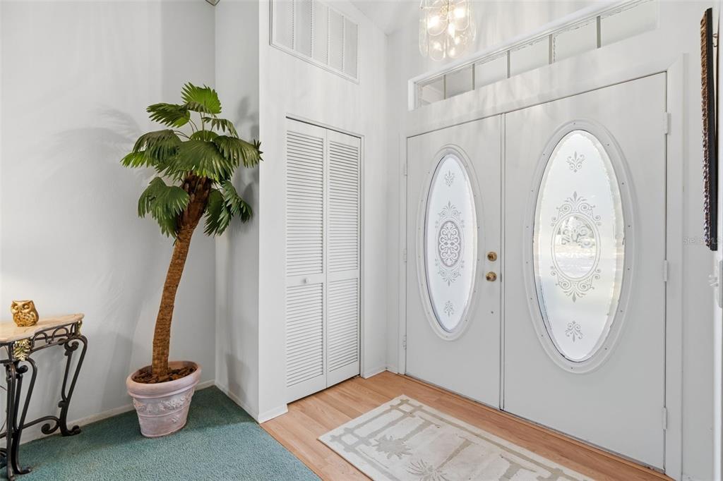 7354 Woodhollow Road Spring Hill, FL 34606 - Photo 8 of 47 a vase with flowers sitting on a table in a room