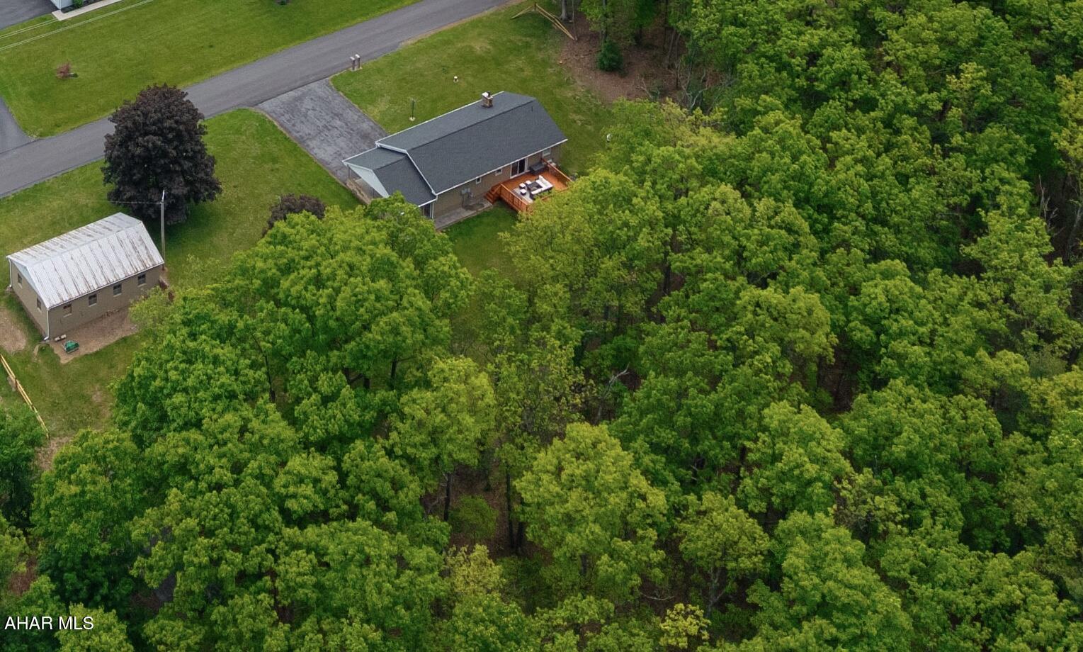 473 Calhoun Road Everett, PA 15537 - Photo 38 of 45 an aerial view of a house with a yard