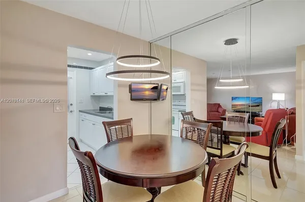 a view of a dining room with furniture