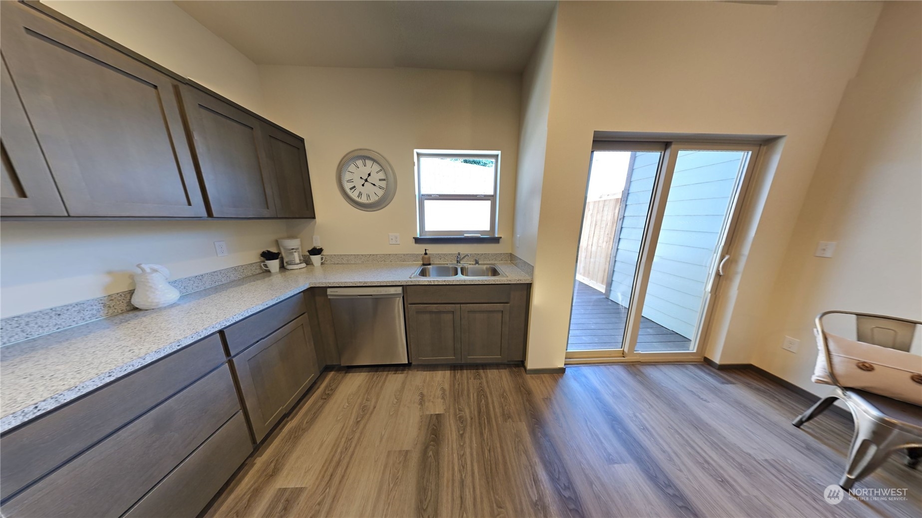 3651 Pine Road Northeast Bremerton, WA 98310 - Photo 13 of 29 a kitchen with a sink and wooden floor
