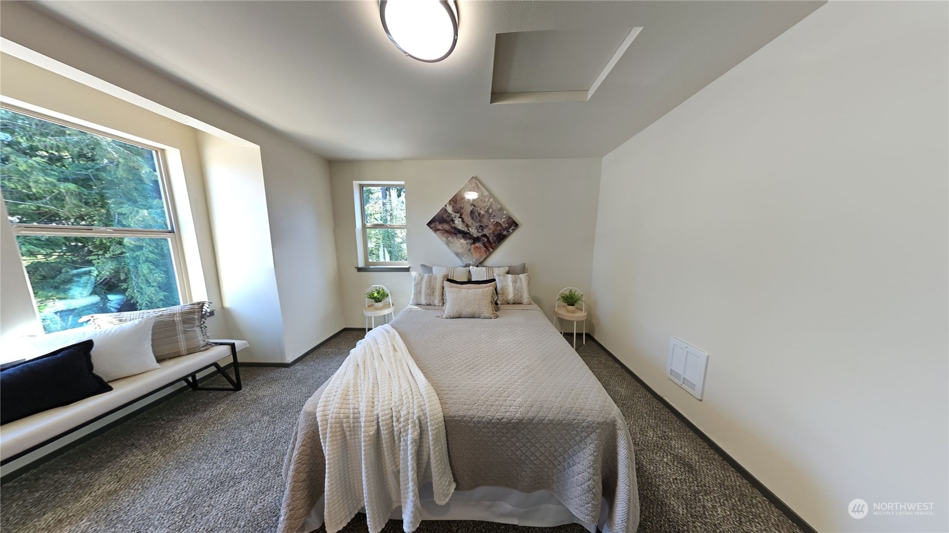 3651 Pine Road Northeast Bremerton, WA 98310 - Photo 17 of 29 a bedroom with bed and a large window