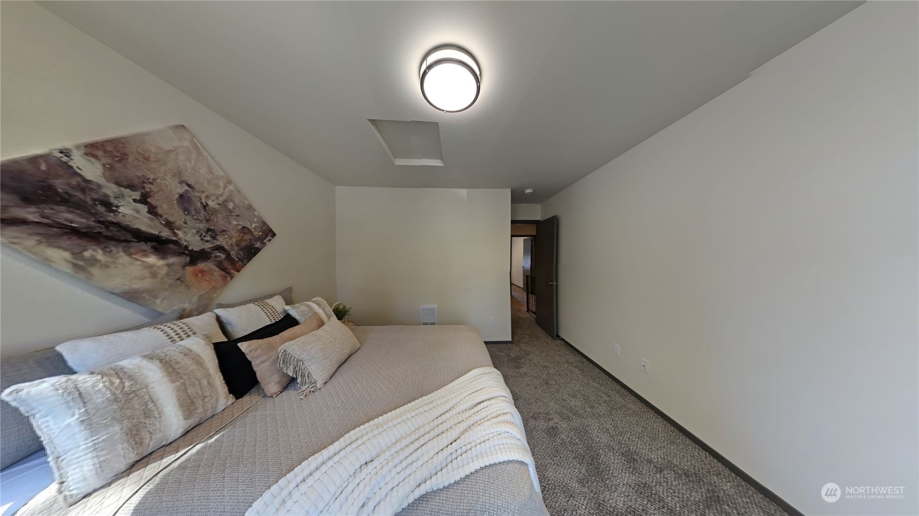 3651 Pine Road Northeast Bremerton, WA 98310 - Photo 18 of 29 a bedroom with a bed and a mirror