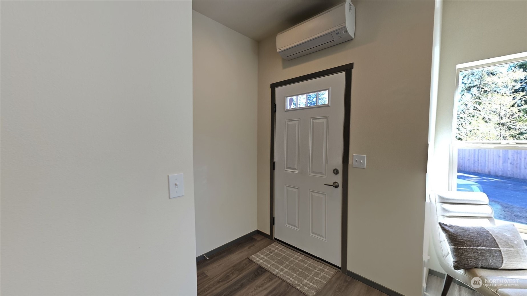 3651 Pine Road Northeast Bremerton, WA 98310 - Photo 8 of 29 a view of a livingroom with wooden floor and a staircase