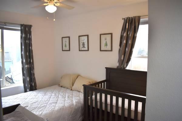 772 Alpine Road Dillon, CO 80435 - Photo 2 of 24 a bedroom with a bed and window