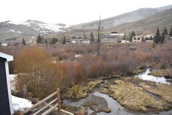 772 Alpine Road Dillon, CO 80435 - Photo 3 of 24 a view of a city from a balcony
