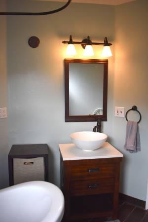 772 Alpine Road Dillon, CO 80435 - Photo 10 of 24 a bathroom with a sink toilet and mirror