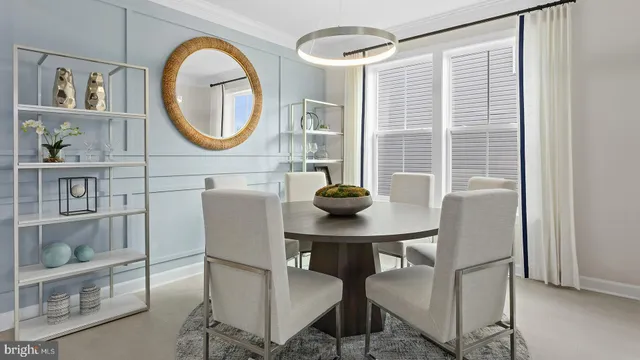 a view of a livingroom with furniture and a mirror