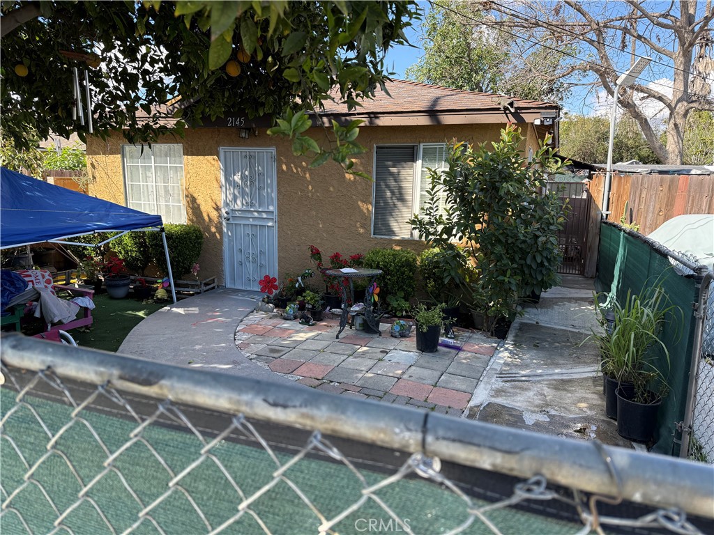 2145 Cogswell Road El Monte, CA 91733 - Photo 1 of 1 a view of a house with a yard and tree s