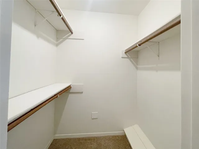 a view of small space with racks on the wall