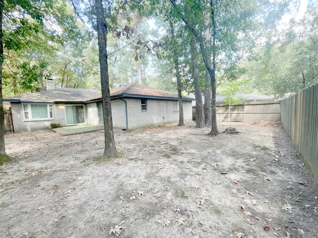 a house with trees in front of it