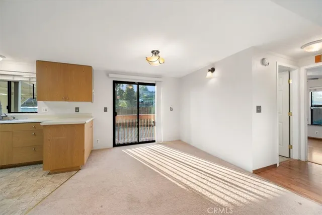 a large bathroom with a sink a mirror and a bathtub