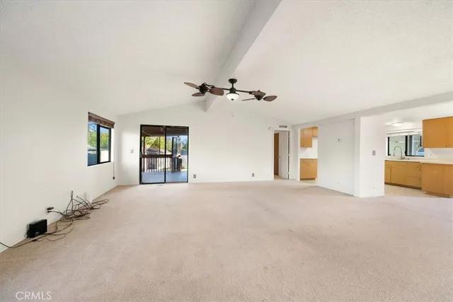 a view of a livingroom with a staircase