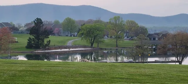 a view of lake with mountain
