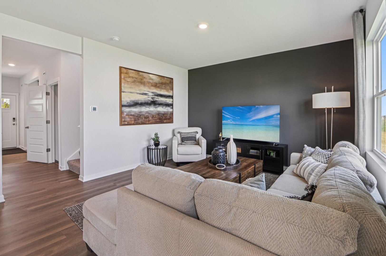 500 Arbor Ridge Drive Hampshire, IL 60140 - Photo 3 of 46 a living room with furniture and wooden floor
