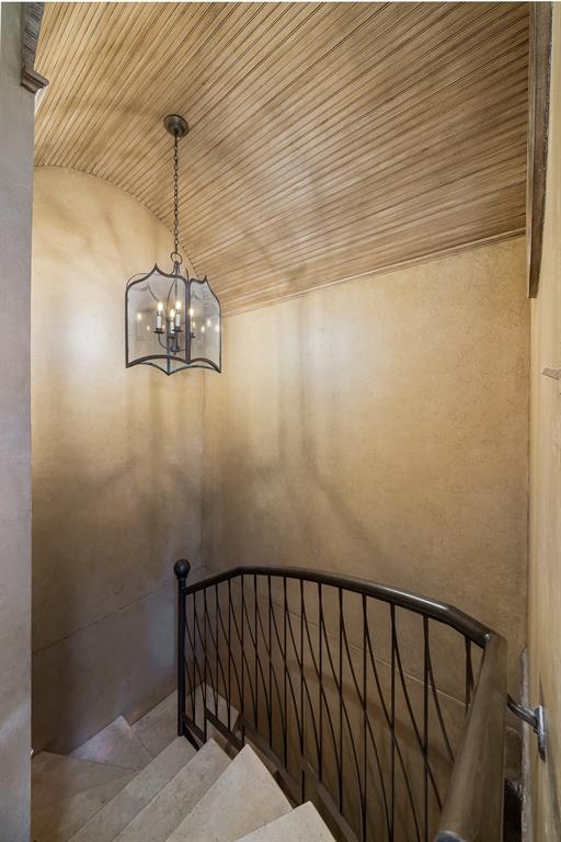2315 Routh Street Dallas, TX 75201 - Photo 15 of 38 a view of a hallway with a chandelier