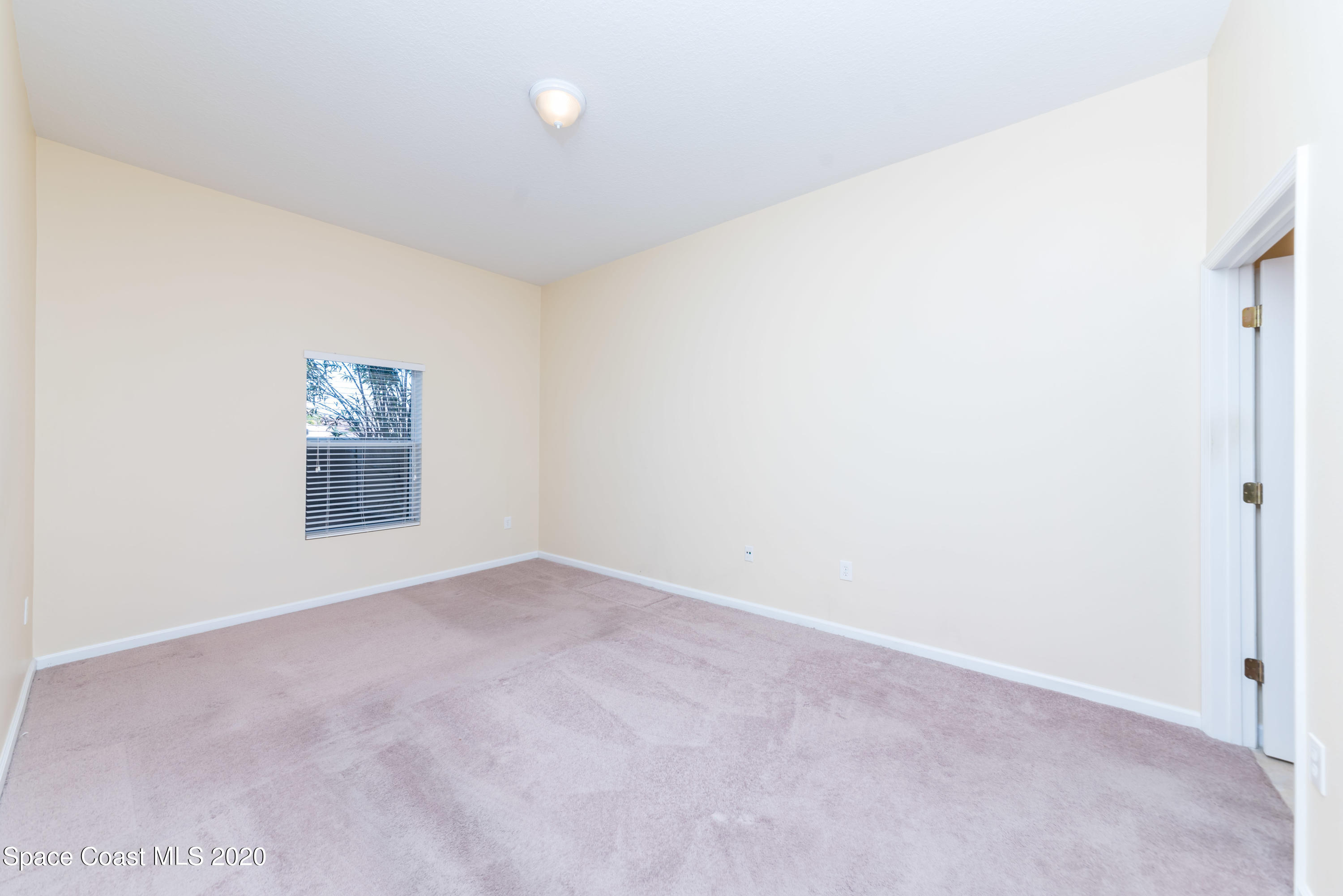 4037 Meander Place, Unit 101 Rockledge, FL 32955 - Photo 11 of 24 Master Bedroom View 1