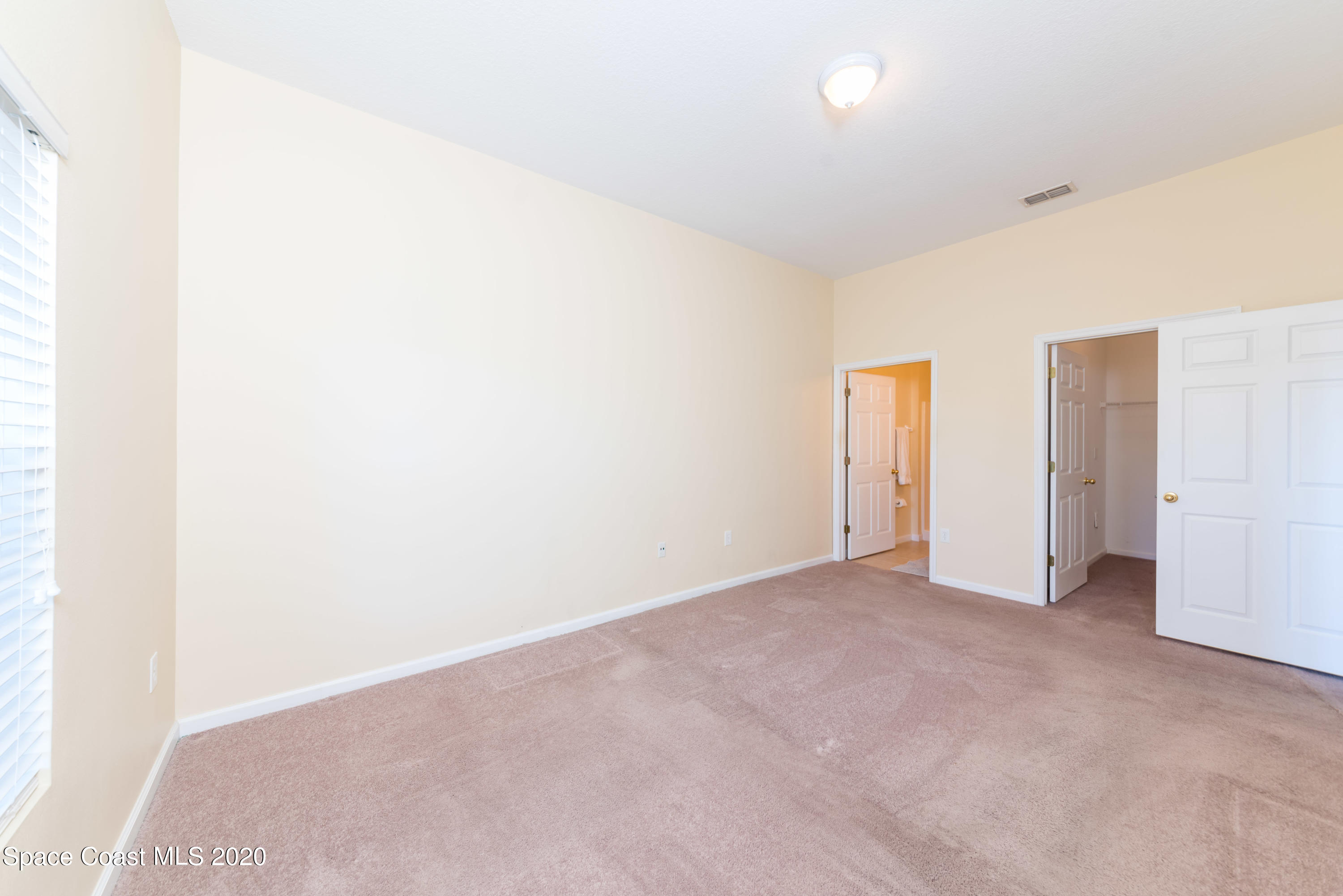 4037 Meander Place, Unit 101 Rockledge, FL 32955 - Photo 12 of 24 Master Bedroom View 2