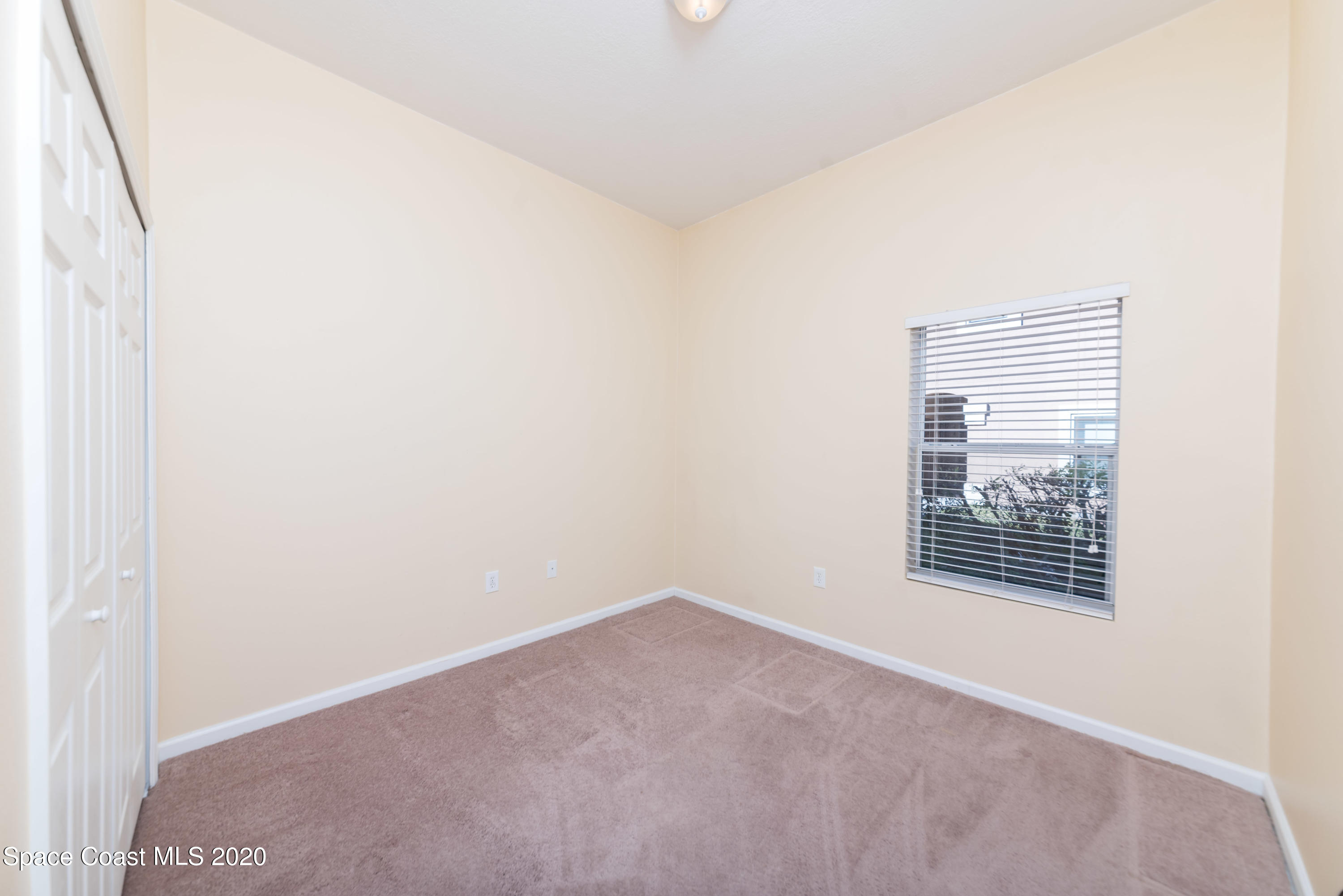4037 Meander Place, Unit 101 Rockledge, FL 32955 - Photo 15 of 24 Bedroom 2 View 1