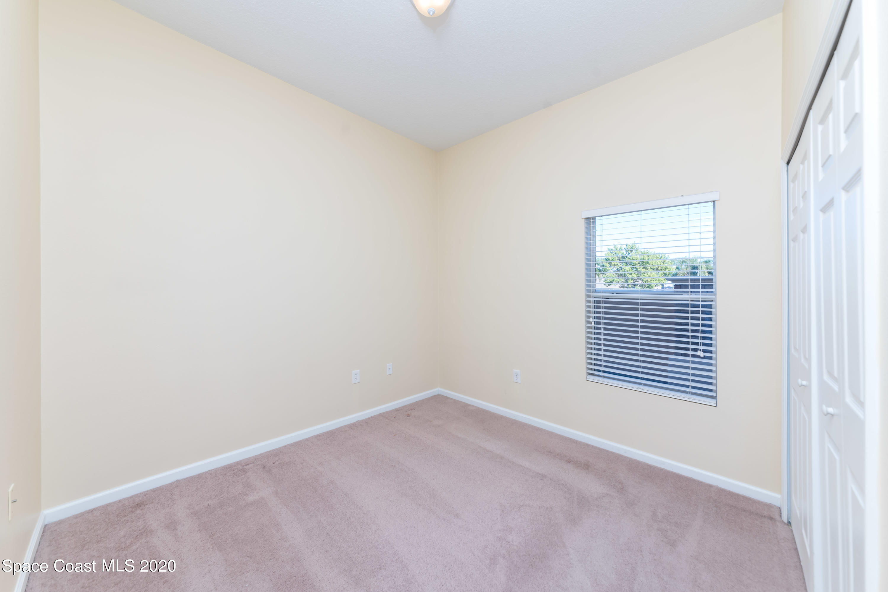 4037 Meander Place, Unit 101 Rockledge, FL 32955 - Photo 17 of 24 Bedroom 3 View 1
