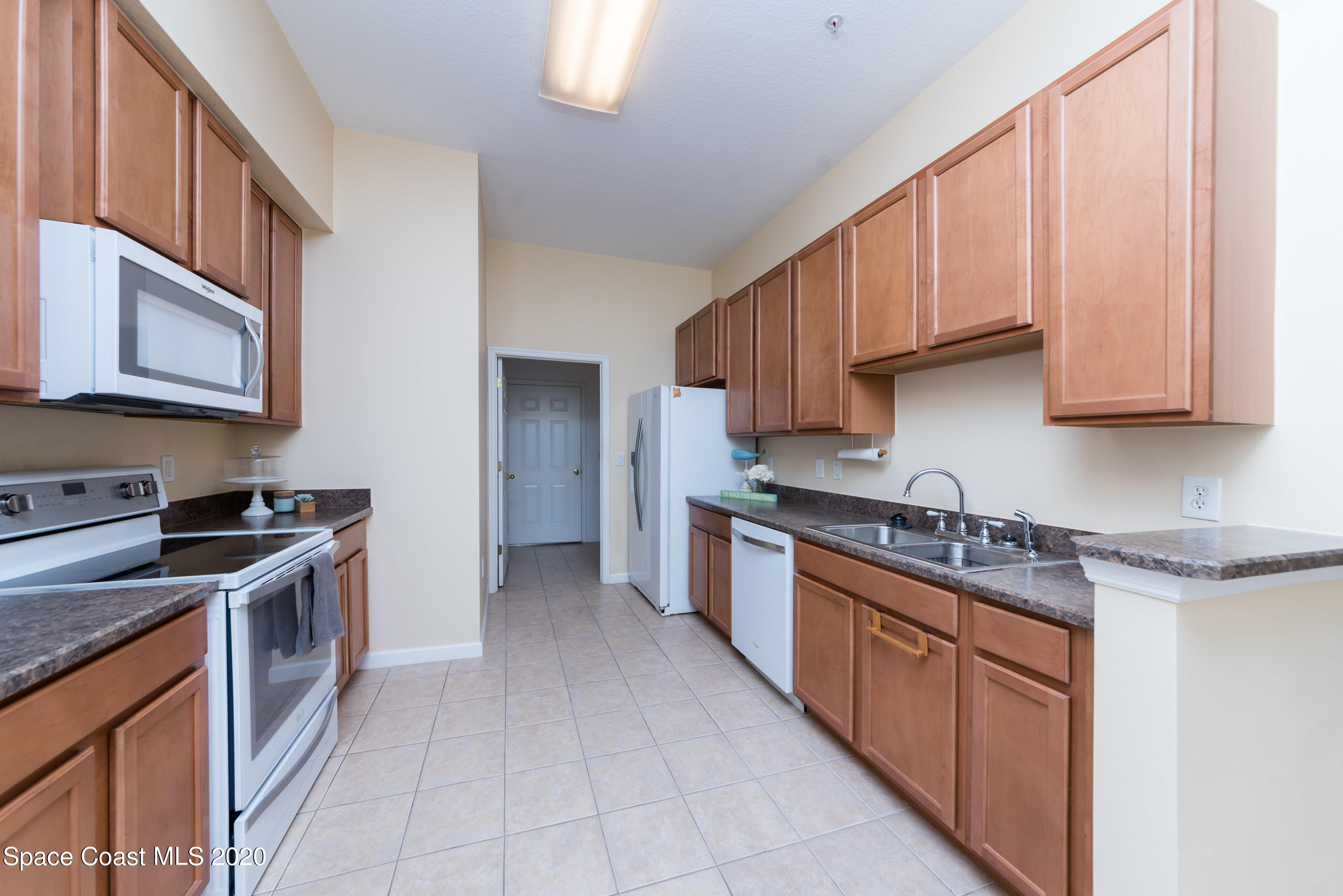4037 Meander Place, Unit 101 Rockledge, FL 32955 - Photo 8 of 24 Kitchen View 2