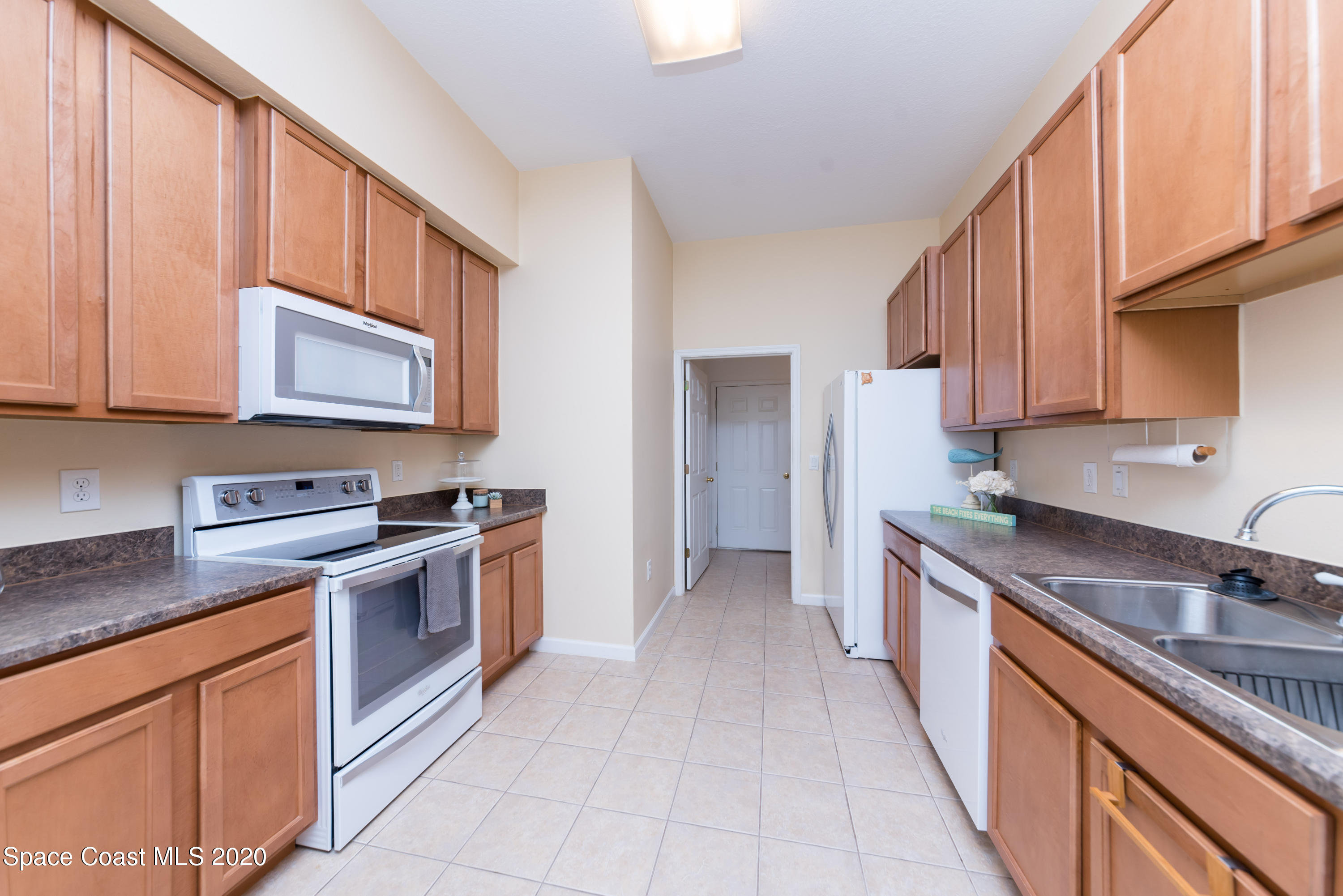 4037 Meander Place, Unit 101 Rockledge, FL 32955 - Photo 10 of 24 Kitchen View 4