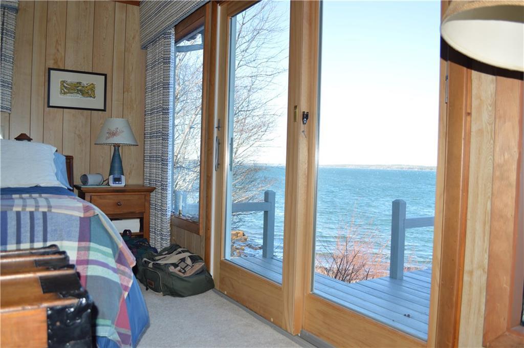 213 Paul Bunyan Road Corea, ME 04624 - Photo 4 of 23 Walk onto the deck from the master...