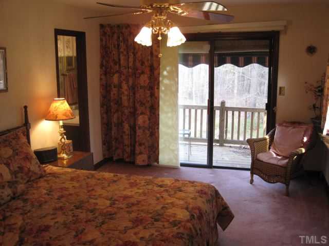 2045 Northwest Maynard Road Cary, NC 27513 - Photo 7 of 10 Second bedroom with its own bath. Also open to second level deck.