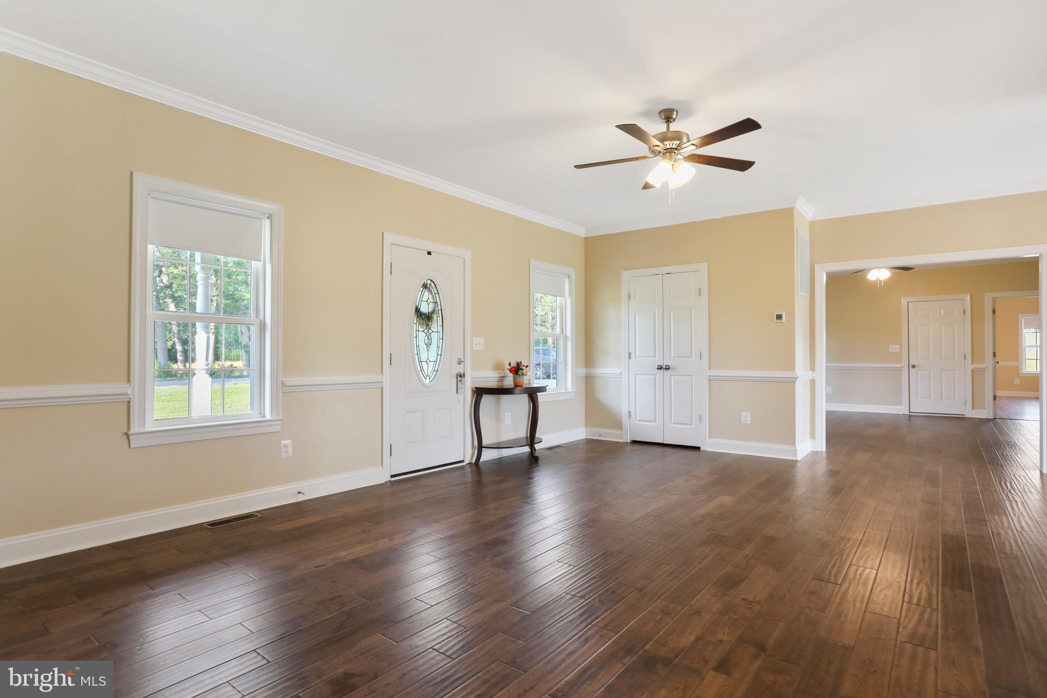2787 Reliance Road Middletown, VA 22645 - Photo 18 of 53 living room with view into formal dining room