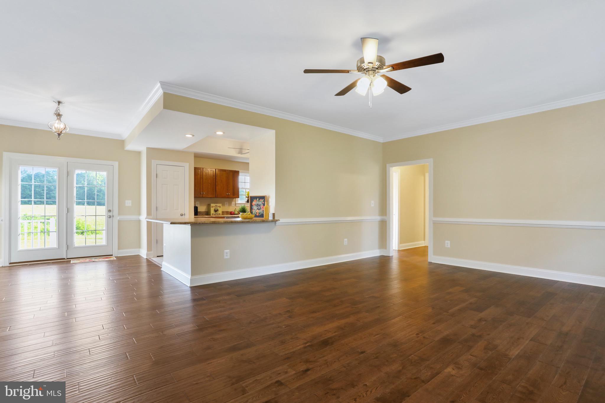 2787 Reliance Road Middletown, VA 22645 - Photo 19 of 53 living room with view into kitchen dining area