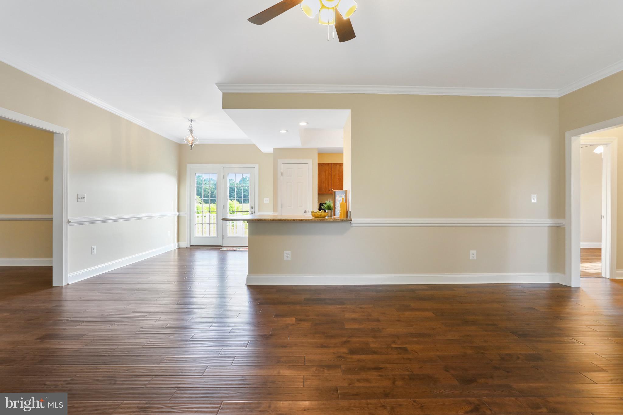 2787 Reliance Road Middletown, VA 22645 - Photo 20 of 53 living room with view into kitchen and dining area