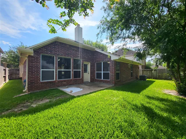 a house view with a garden space