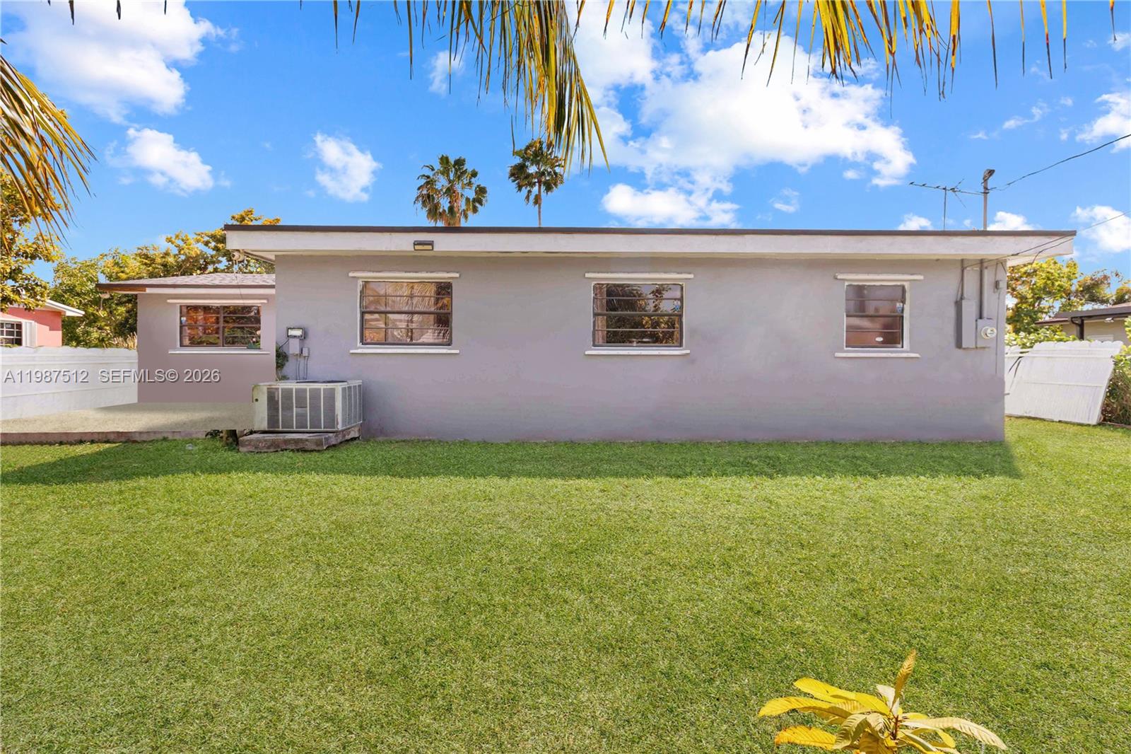 14461 Southwest 285th Street Homestead, FL 33033 - Photo 17 of 17 a front view of a house with a yard