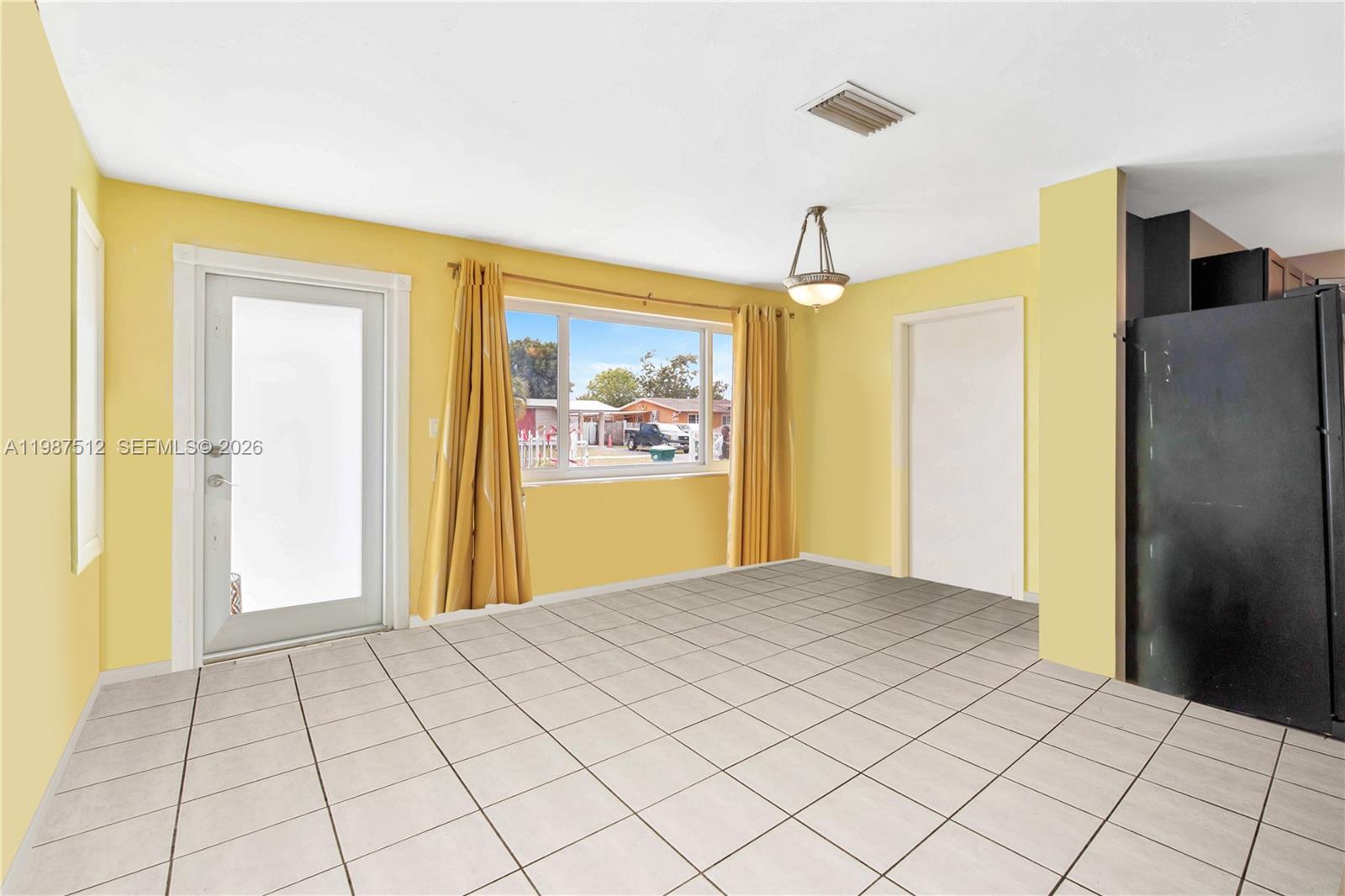 14461 Southwest 285th Street Homestead, FL 33033 - Photo 4 of 17 a view of a room with a staircase