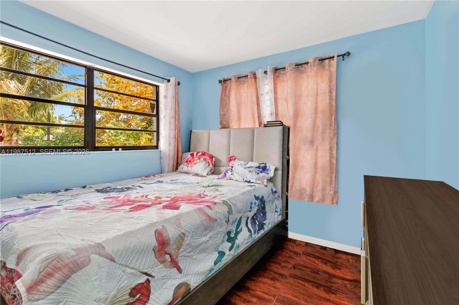 14461 Southwest 285th Street Homestead, FL 33033 - Photo 10 of 17 a bedroom with a bed and a window