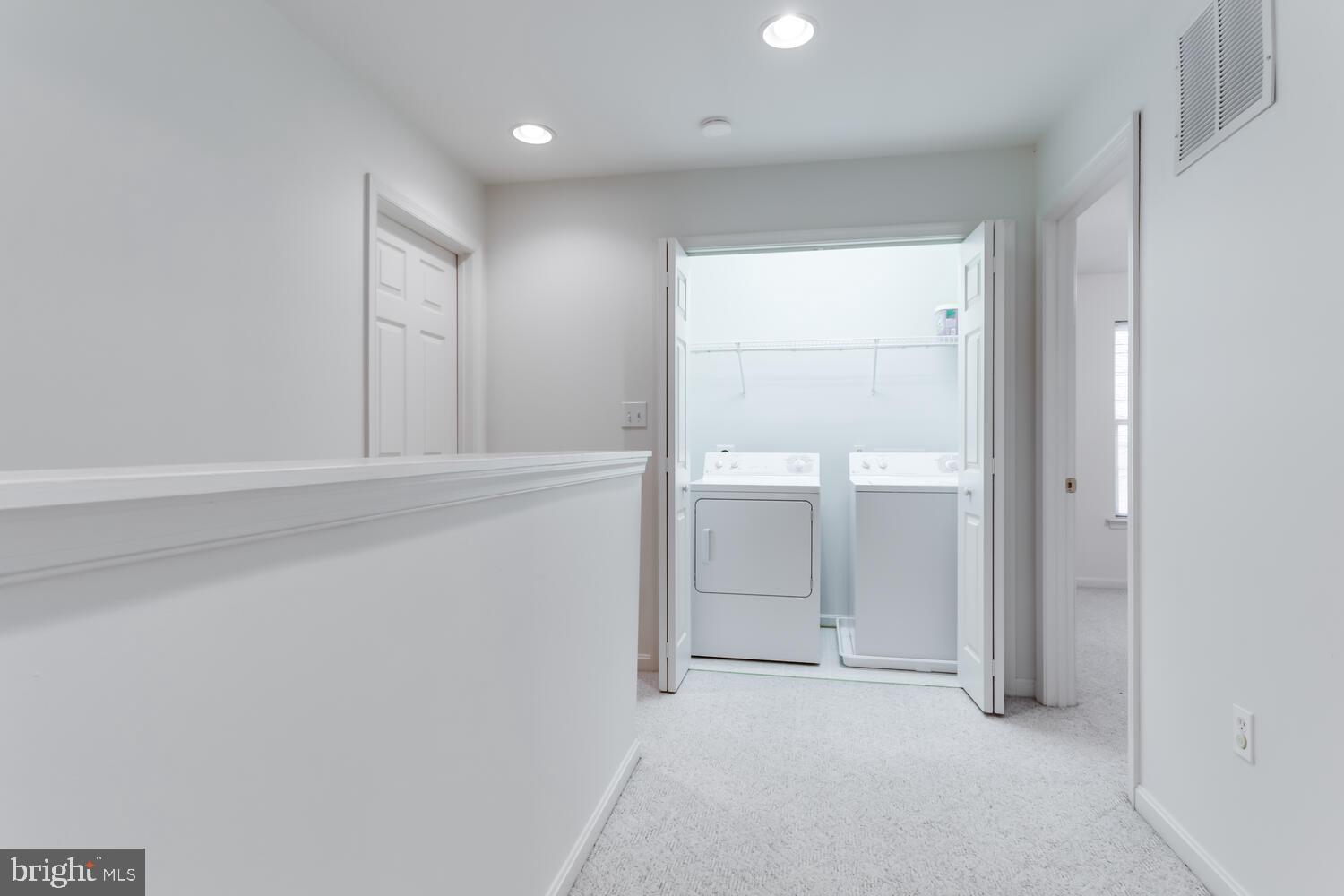 17370 Rock Point Road Newburg, MD 20664 - Photo 41 of 71 Laundry on upper level