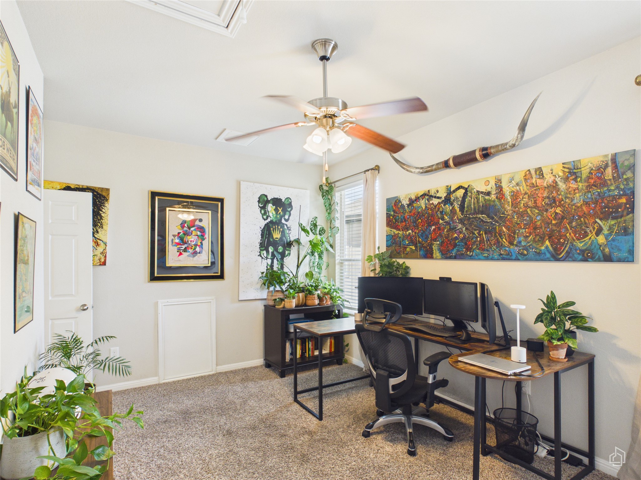 9310 Tanager Way Austin, TX 78748 - Photo 24 of 32 An inviting office space, perfect for remote work or a creative studio, features comfortable carpeting and a ceiling fan.